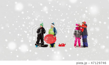 happy little kids with sleds in winter 47129746