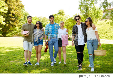 friends with guitar going to picnic at park friends with guitar going to picnic at park 47130220