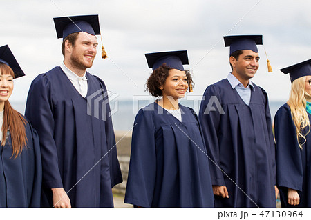 happy students or bachelors in mortar boards happy students or bachelors in mortar boards 47130964