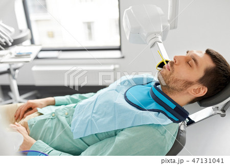 patient having x-ray scanning at dental clinic 47131041
