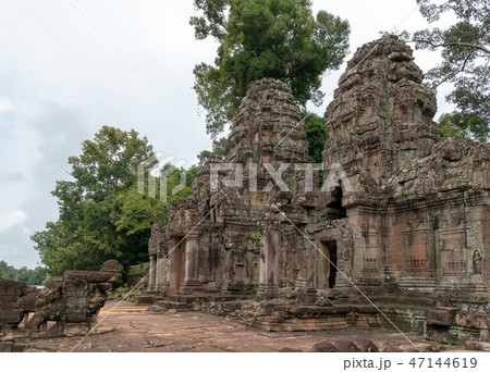 Preah Khan temple entrance on river bank 47144619
