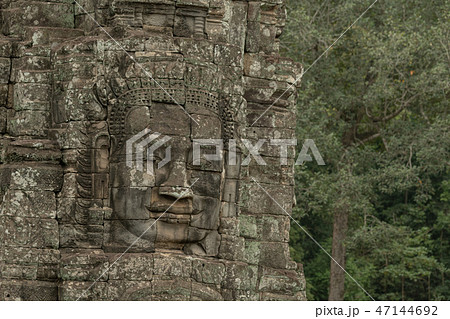 Frieze of Buddha face on Bayon wall Frieze of Buddha face on Bayon wall 47144692