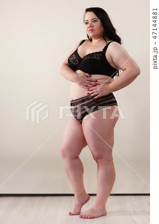 Plus size model wearing black lingerie Plus size model wearing black lingerie 47144881