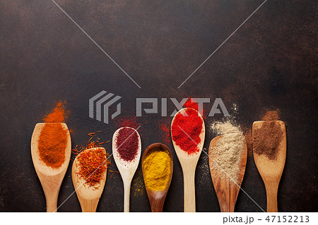 Set of various spices in spoons 47152213
