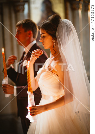 newlyweds wedding ceremony in the church,wedding  47153575