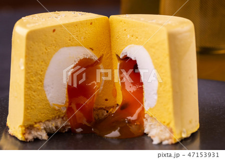 Mango and passion fruit in a dessert on a plate Mango and passion fruit in a dessert on a plate 47153931