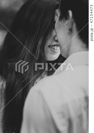 Beautiful young couple in the park Beautiful young couple in the park 47154473