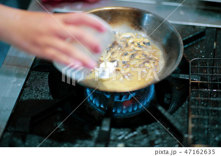 Chef cooking food in the kitchen, preparing food 47162635