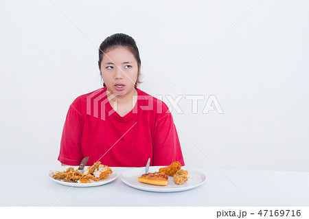 Woman with fast food 47169716