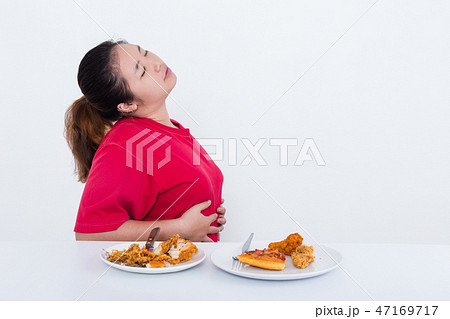 Woman with fast food Woman with fast food 47169717