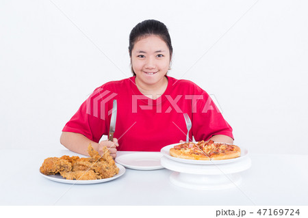 Woman with fast food Woman with fast food 47169724