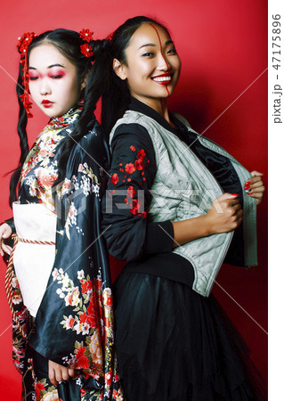 two pretty geisha girls friends modern asian woman and
