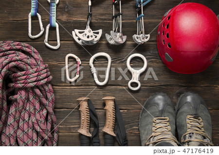 climbing and travel equipment on dark background climbing and travel equipment on dark background 47176419