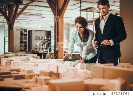 Confident team of engineers working together in a architect studio 47178745