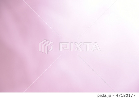 ピンク系の抽象背景 グレイがかったピンク色の写真素材