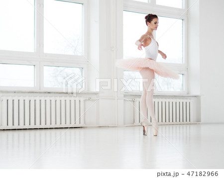Gracefull ballerina in a dance studio Gracefull ballerina in a dance studio 47182966