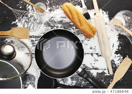 Baking background with bread, flour, rolling pin 47186646
