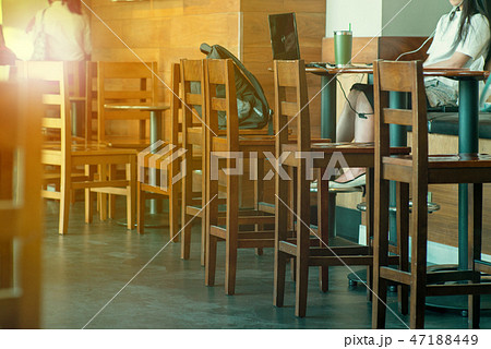 Vintage wooden furniture with a woman working Vintage wooden furniture with a woman working 47188449