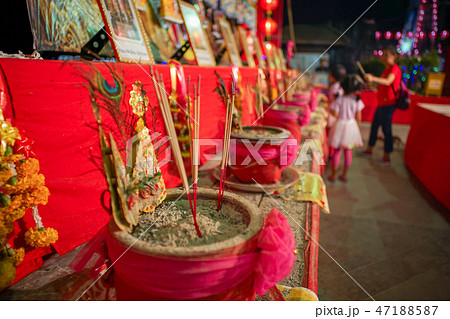 Selective focus on the fired incenses in ashtray 47188587