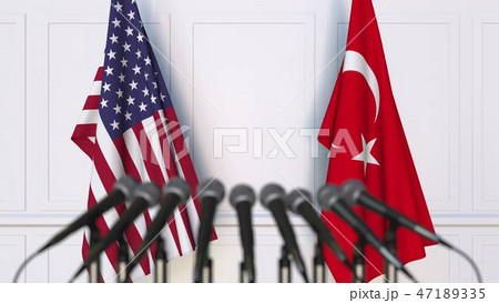Flags of the USA and Turkey at international meeting or conference. 3D rendering Flags of the USA and Turkey at international meeting or conference. 3D rendering 47189335