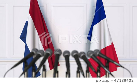 Flags of the Netherlands and France at international meeting or conference. 3D rendering Flags of the Netherlands and France at international meeting or conference. 3D rendering 47189405