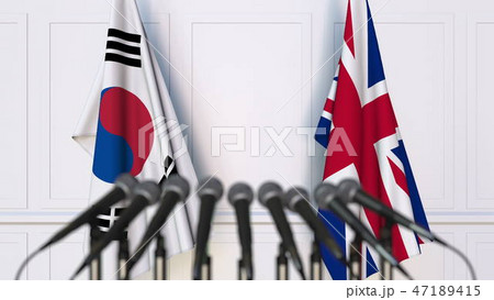 Flags of South Korea and The United Kingdom at international meeting or conference. 3D rendering Flags of South Korea and The United Kingdom at international meeting or conference. 3D rendering 47189415