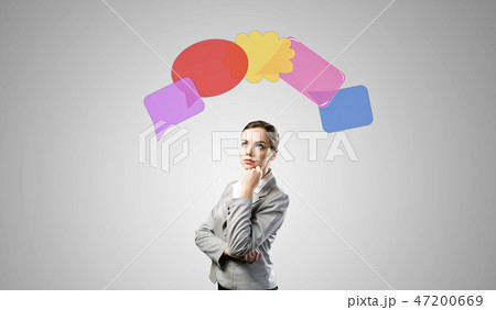 Woman thinking about something Woman thinking about something 47200669