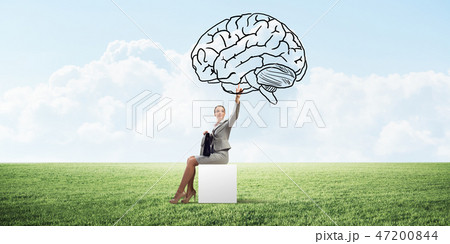 Attractive business lady or accountant outdoors on white box 47200844