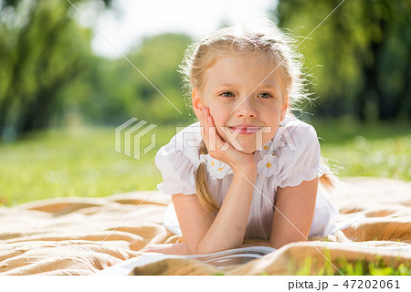 Girl enjoying summertime Girl enjoying summertime 47202061