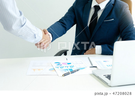 executive businessman hand shake with another 47208028