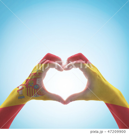 Spain national flag pattern on hand in heart shape Spain national flag pattern on hand in heart shape 47209900