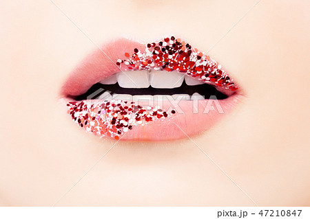 Pastel pink color lips with glitter and tint 47210847