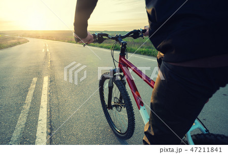 Ride on bicycle on the road Ride on bicycle on the road 47211841