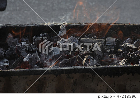 Charcoal fire. 47213596