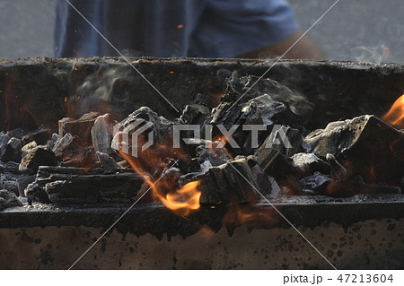 Charcoal fire. 47213604