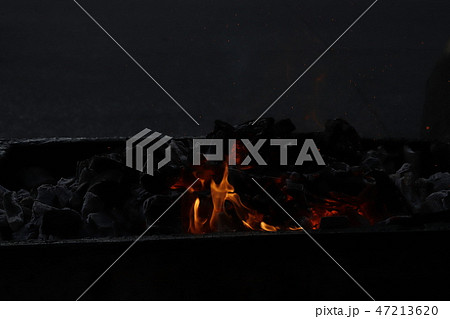 Charcoal fire. 47213620
