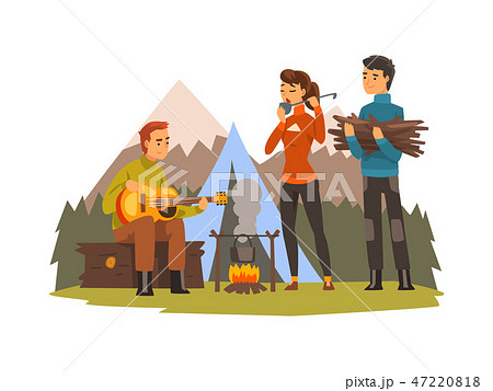 People camping, tourists sitting near fire, playing guitar and cooking, outdoor adventures travel 47220818