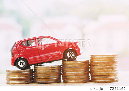 Little red car over a lot of money Little red car over a lot of money 47221162