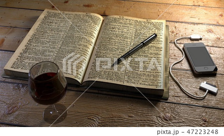 Wine, Book, Pen, Phone on table 47223248