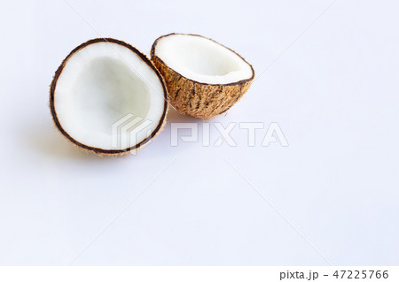 Ripe coconuts on white. 47225766