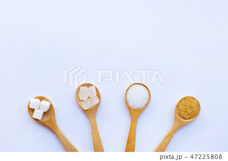 Various types of sugar on white. 47225808