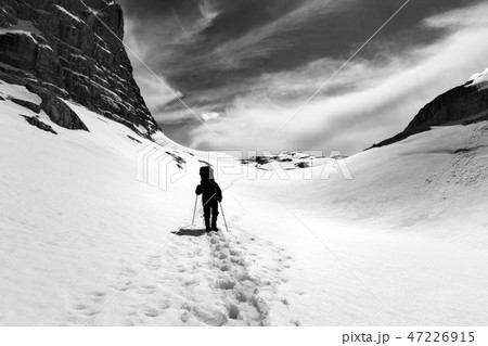 Black and white silhouette of hiker on plateau Black and white silhouette of hiker on plateau 47226915