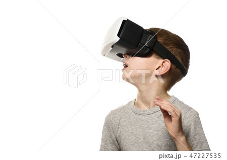 Boy experiencing virtual reality. Portrait Isolate Boy experiencing virtual reality. Portrait Isolate 47227535