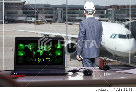 businessman is  looking airplane 47231141