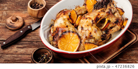 Baked chicken with orange sauce Baked chicken with orange sauce 47236826