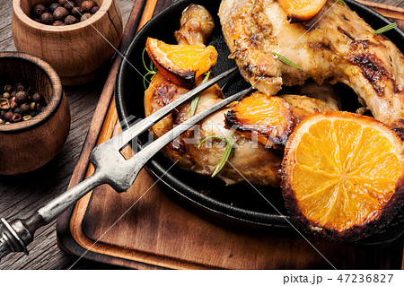 Roast chicken with orange Roast chicken with orange 47236827