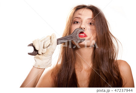 woman and wrench woman and wrench 47237944