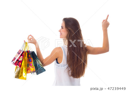 Woman with shopping bags 47239449