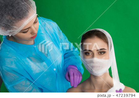 The patient is binded up by doctor The patient is binded up by doctor 47239794