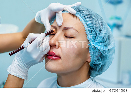 tattoo eyebrow and lips 47244593